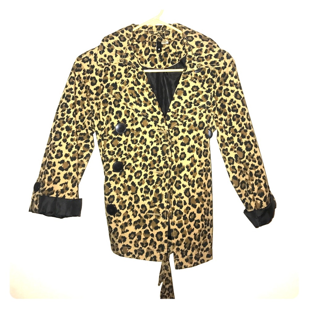Never worn. Leopard print rain jacket