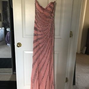 Peach beaded prom dress