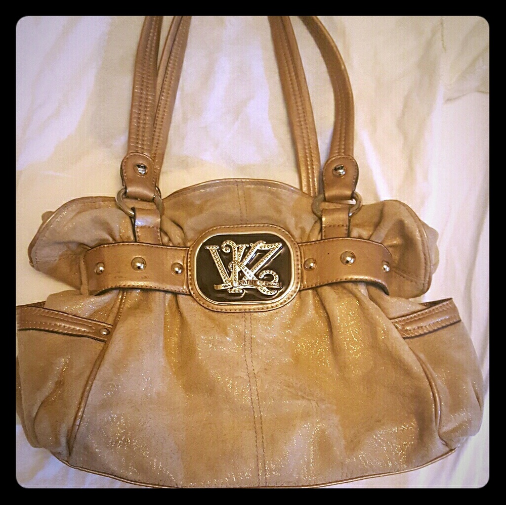 Gold suede Kathy Van Zeeland purse