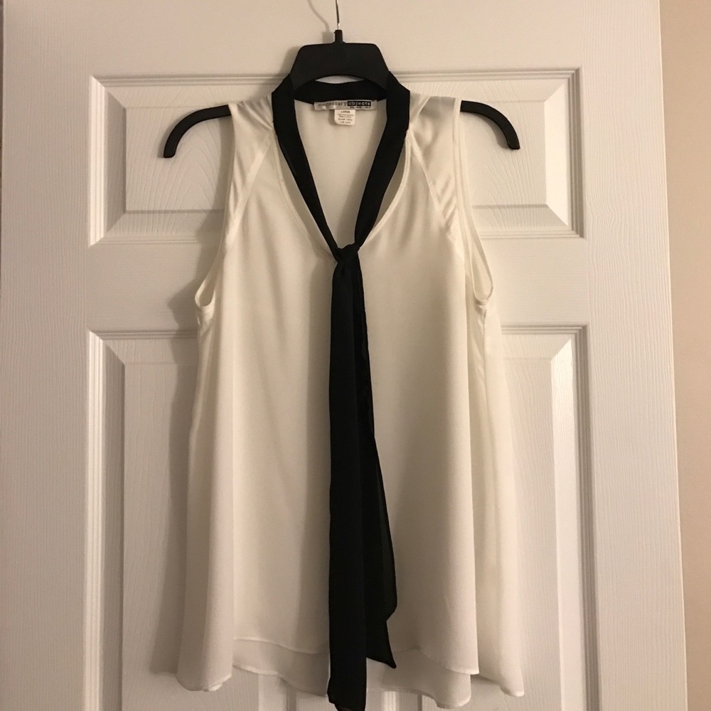 NECESSARY OBJECTS sleeveless blouse
