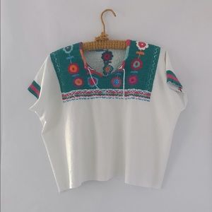 Vintage embroidered blouse with raw-edged hem