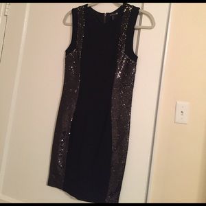 Black sequin body con dress