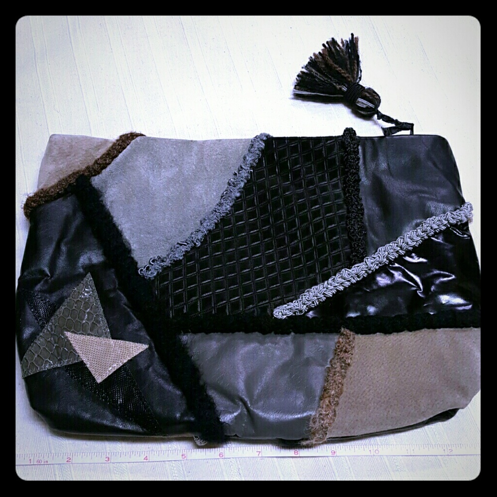 Opulent Containers large leather clutch bag