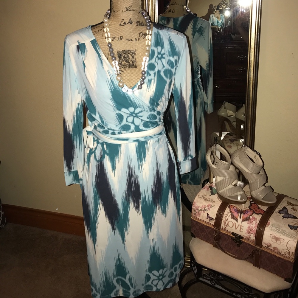 This is a beautiful wrap like dress.