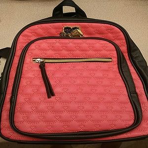Pink and black backpack
