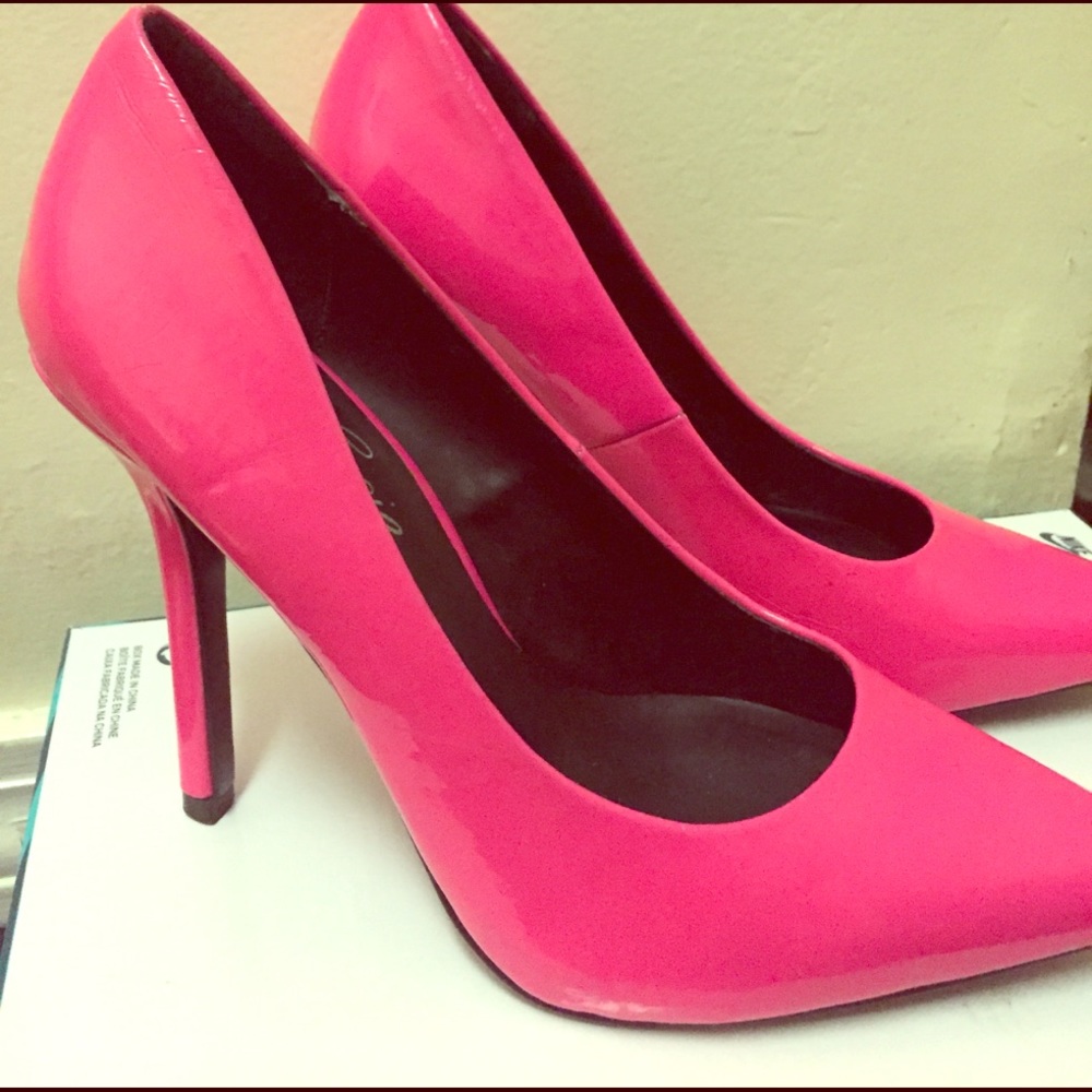 Neon pink pumps