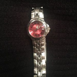 Eddie Bauer watch with red face.