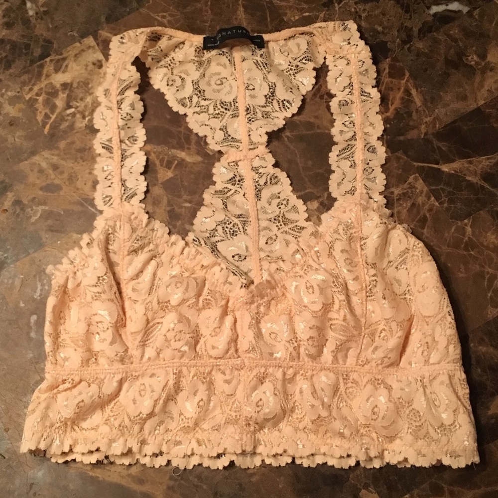 Light peach/creamy colored lace bralette