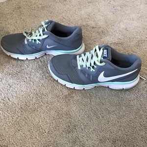 Gray and Blue Nike Tennis Shoes