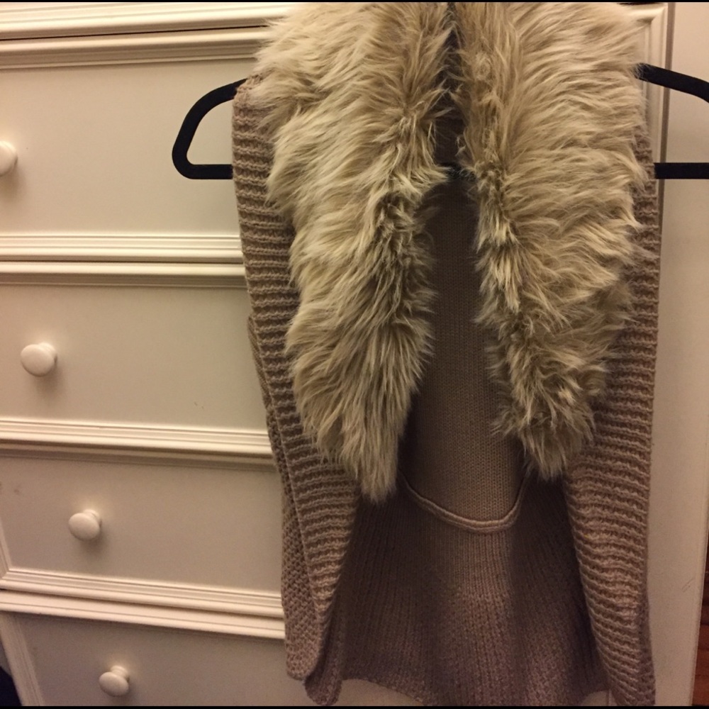 Tan/light brown vest with fur detail!