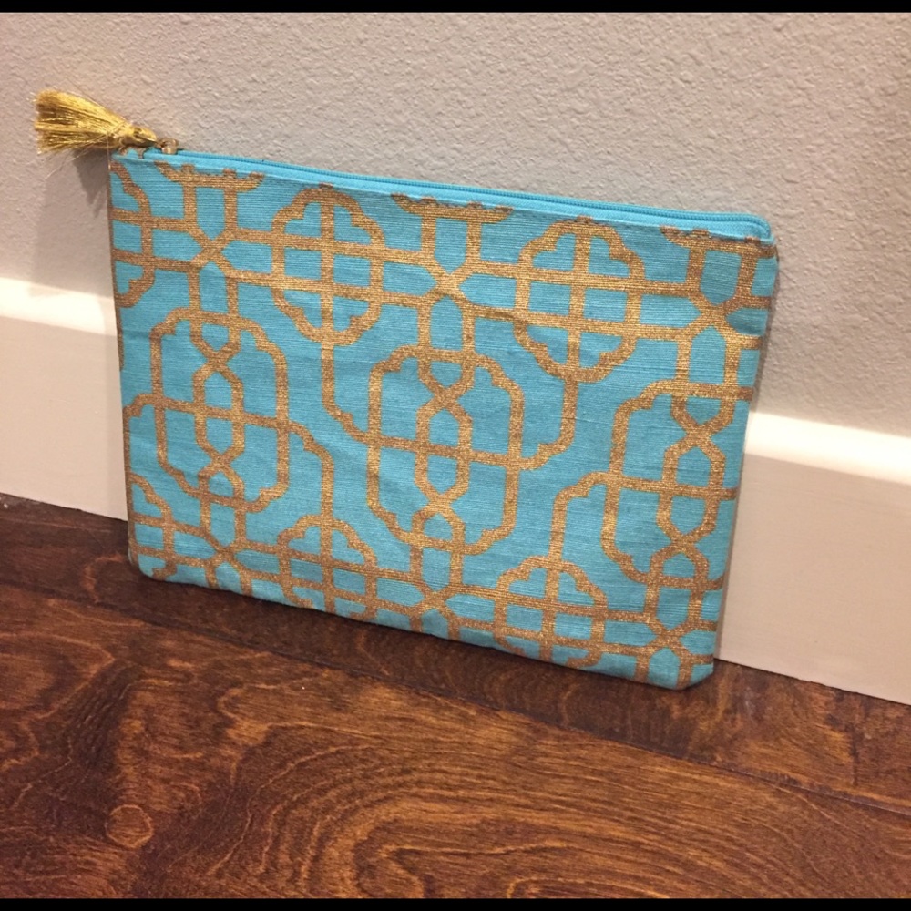 NWOT Turquoise and gold clutch!