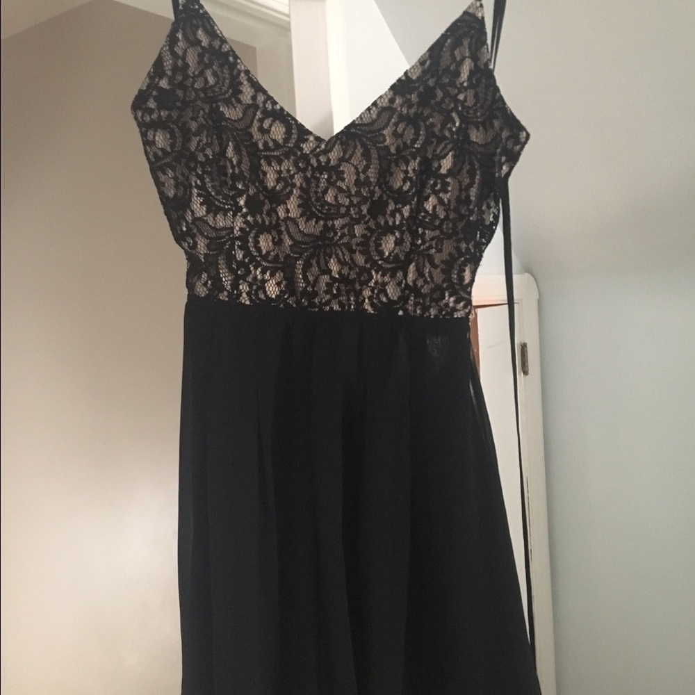 Black and cream romper and dress