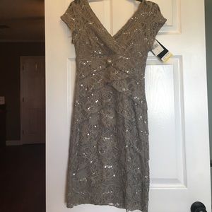 Beautiful Sheath taupe dress never worn with tags