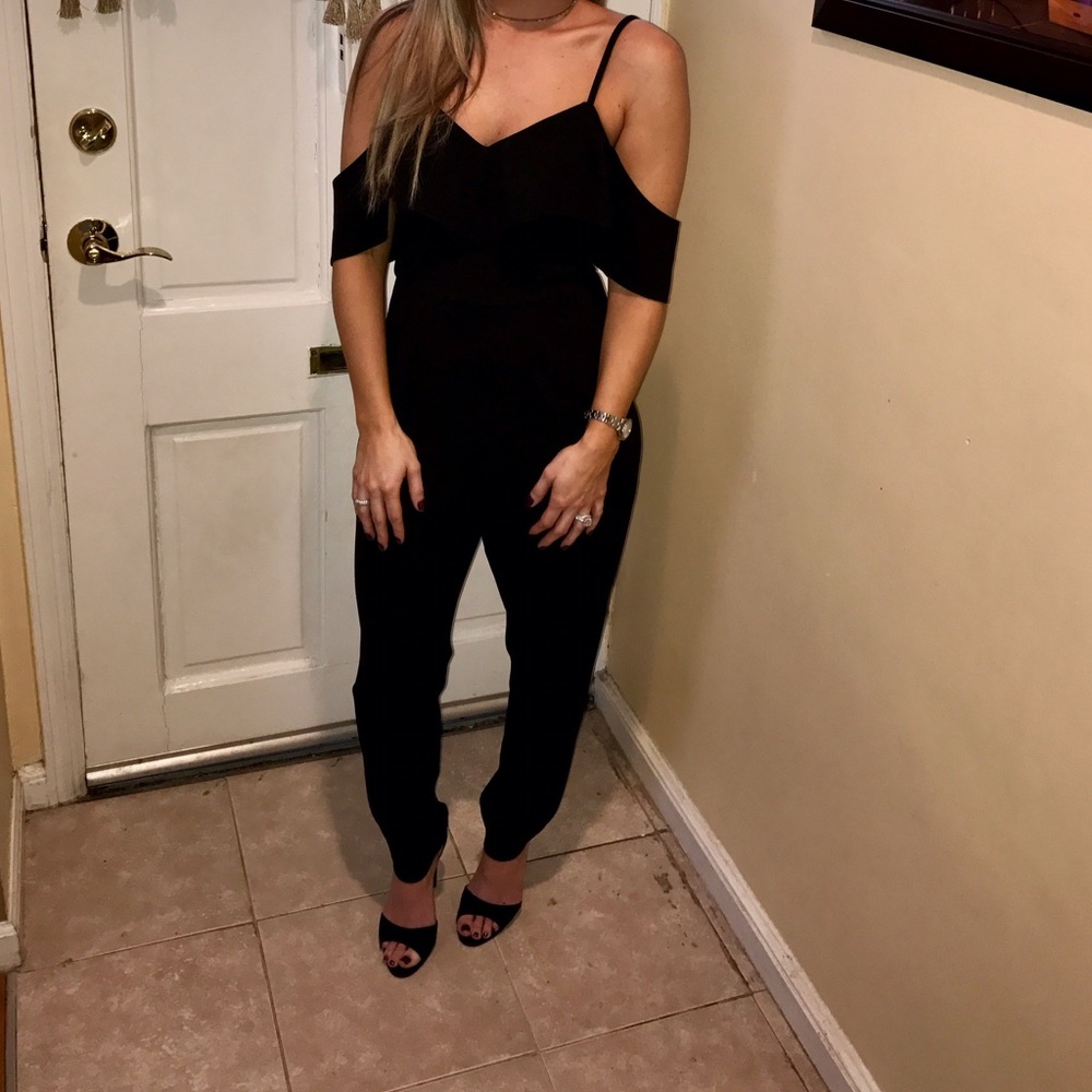 This is a cold shoulder asos black jumpsuit