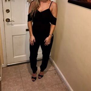 This is a cold shoulder asos black jumpsuit