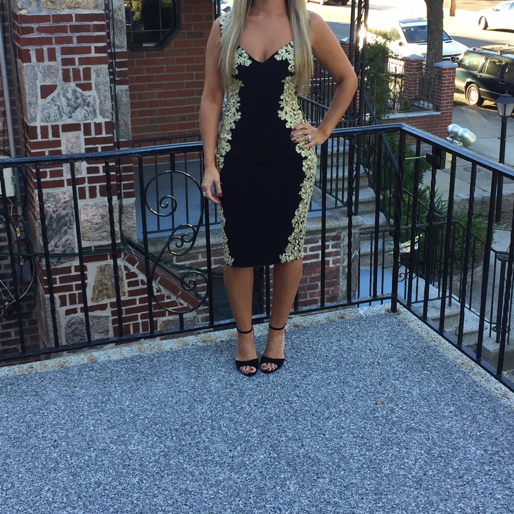 Black and gold midi dress