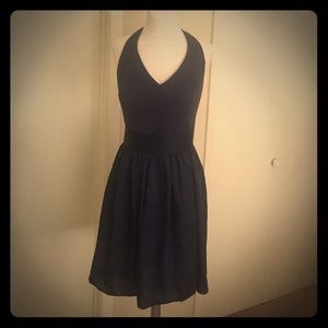 Short v-neck halter dress with bow detail