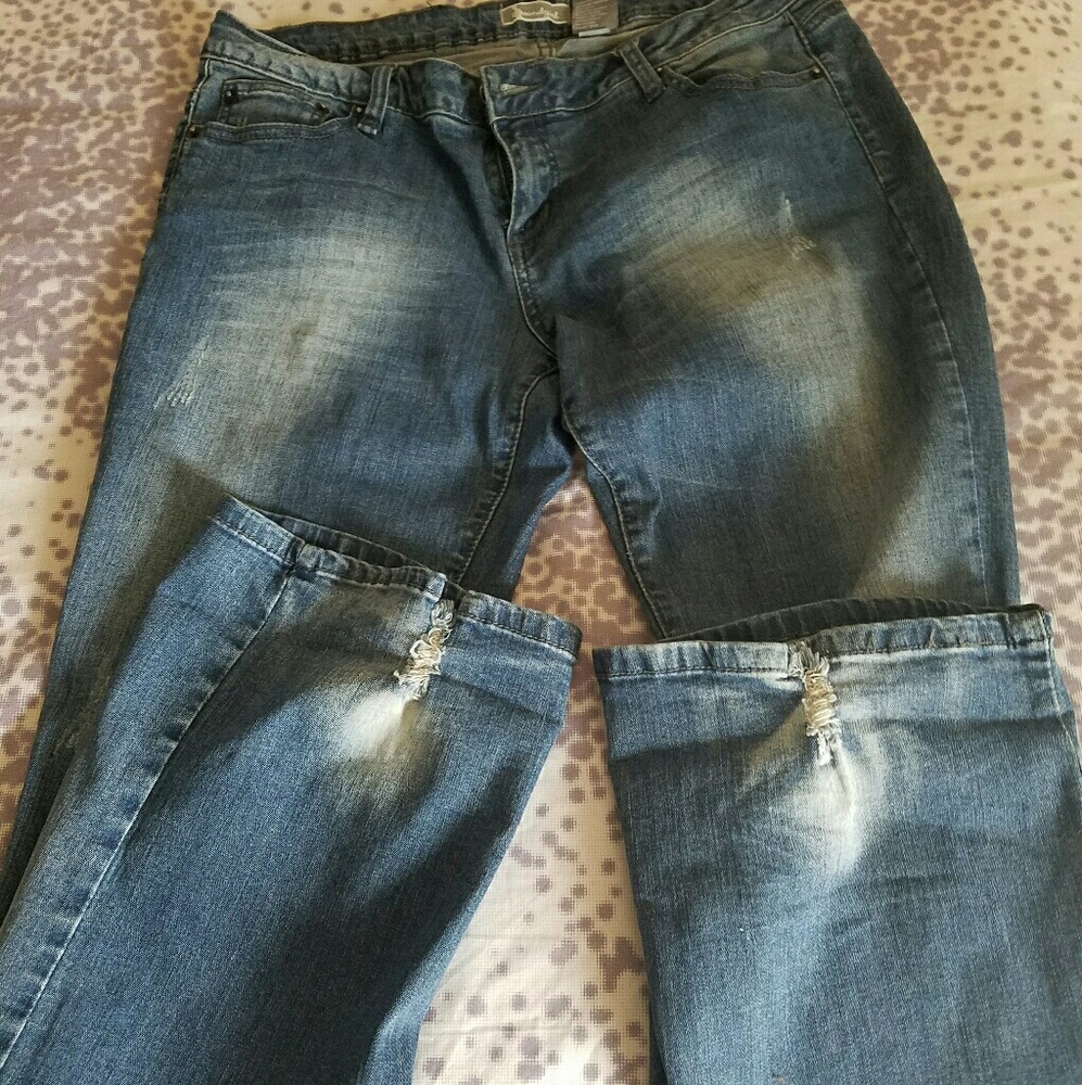 Distressed blue jeans