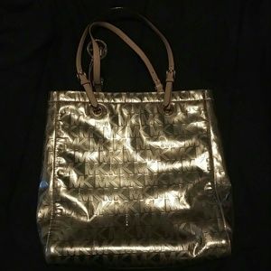 Michael Kors jet Mk signature gold mirror metallic