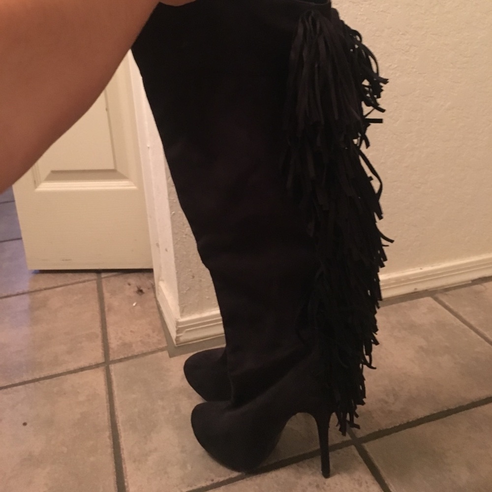 Black fringe heel boots