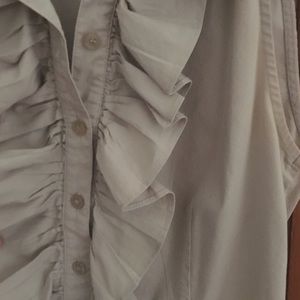 No Sleeve Cream Ruffle Top