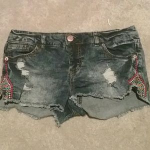 Distressed, torn jean shorts