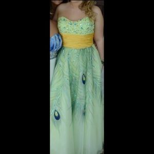 Tony Bowls peacock feather prom gown
