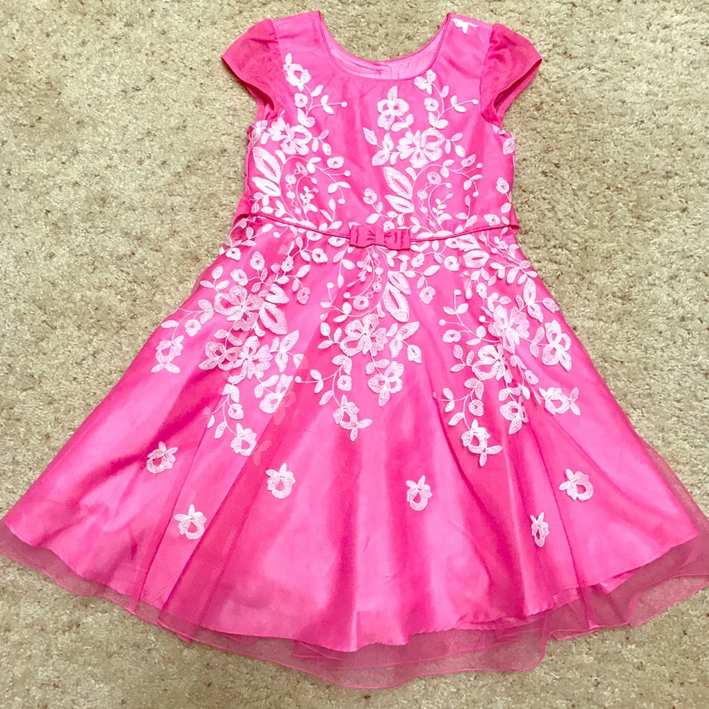 Pink dress with with embroidery floral design.