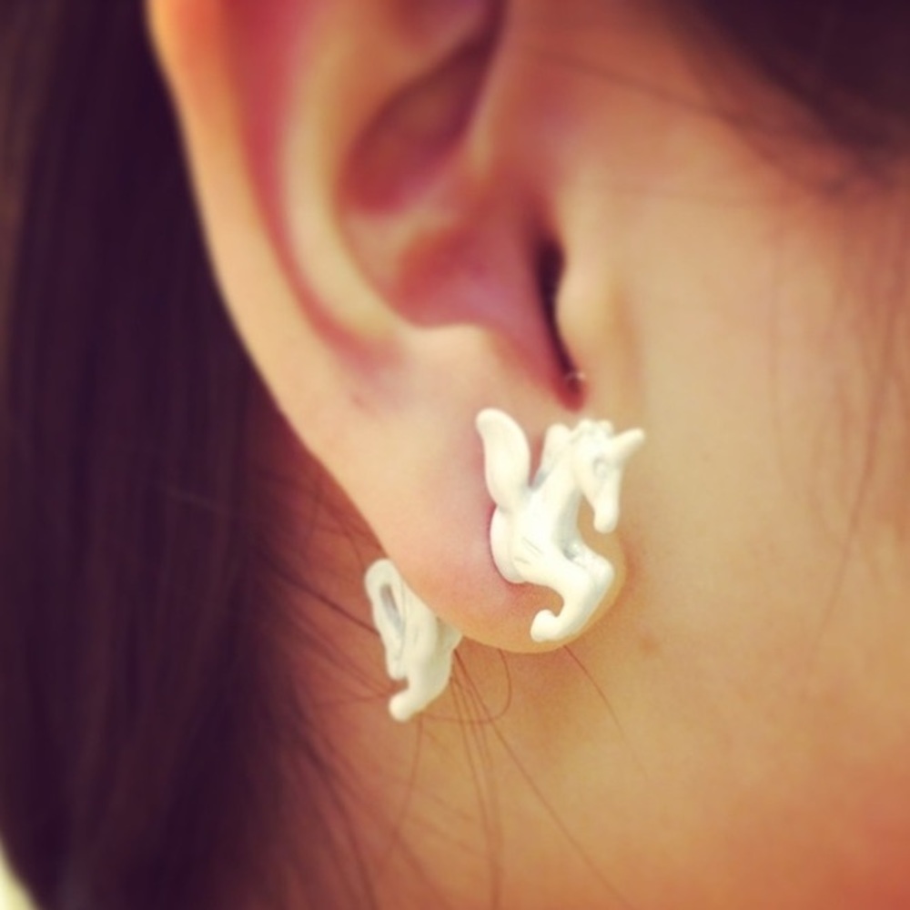 Pair of ceramic unicorn earrings.