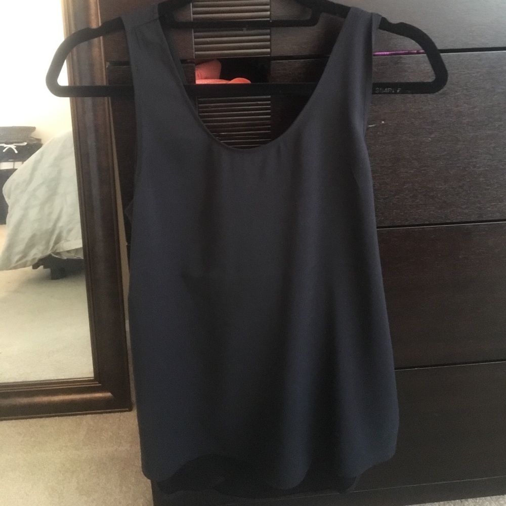 NWT Express criss crossed part open back top