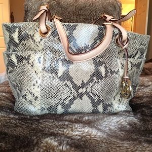 Snake skin Michael Kors purse.