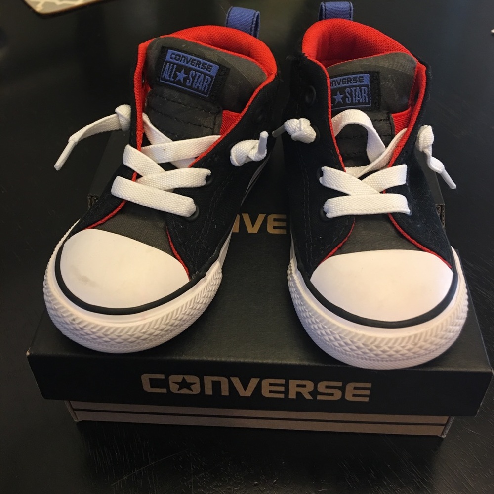 Black and red kids converse