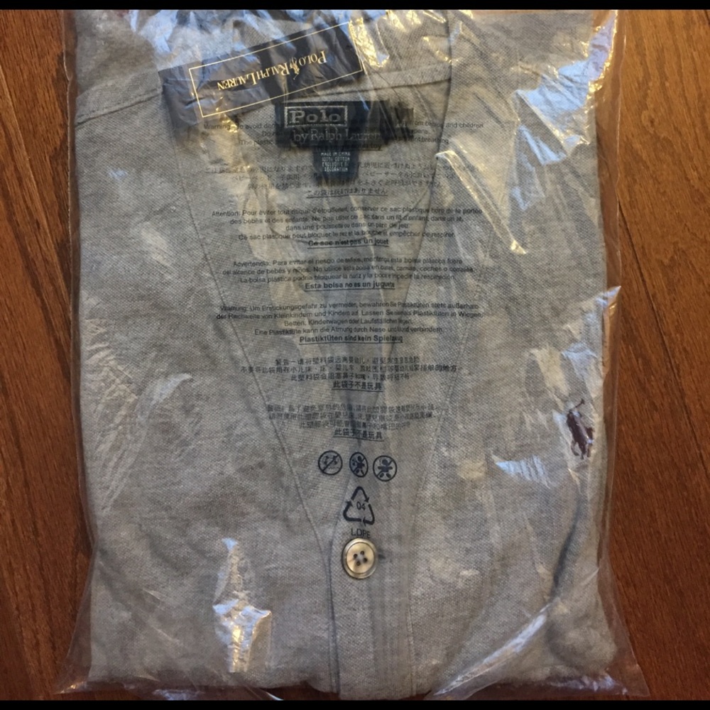 This is a new polo by Ralph Lauren mesh cardigan