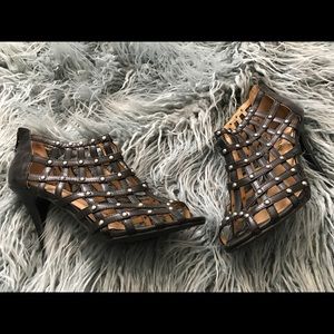 Studded black caged heels