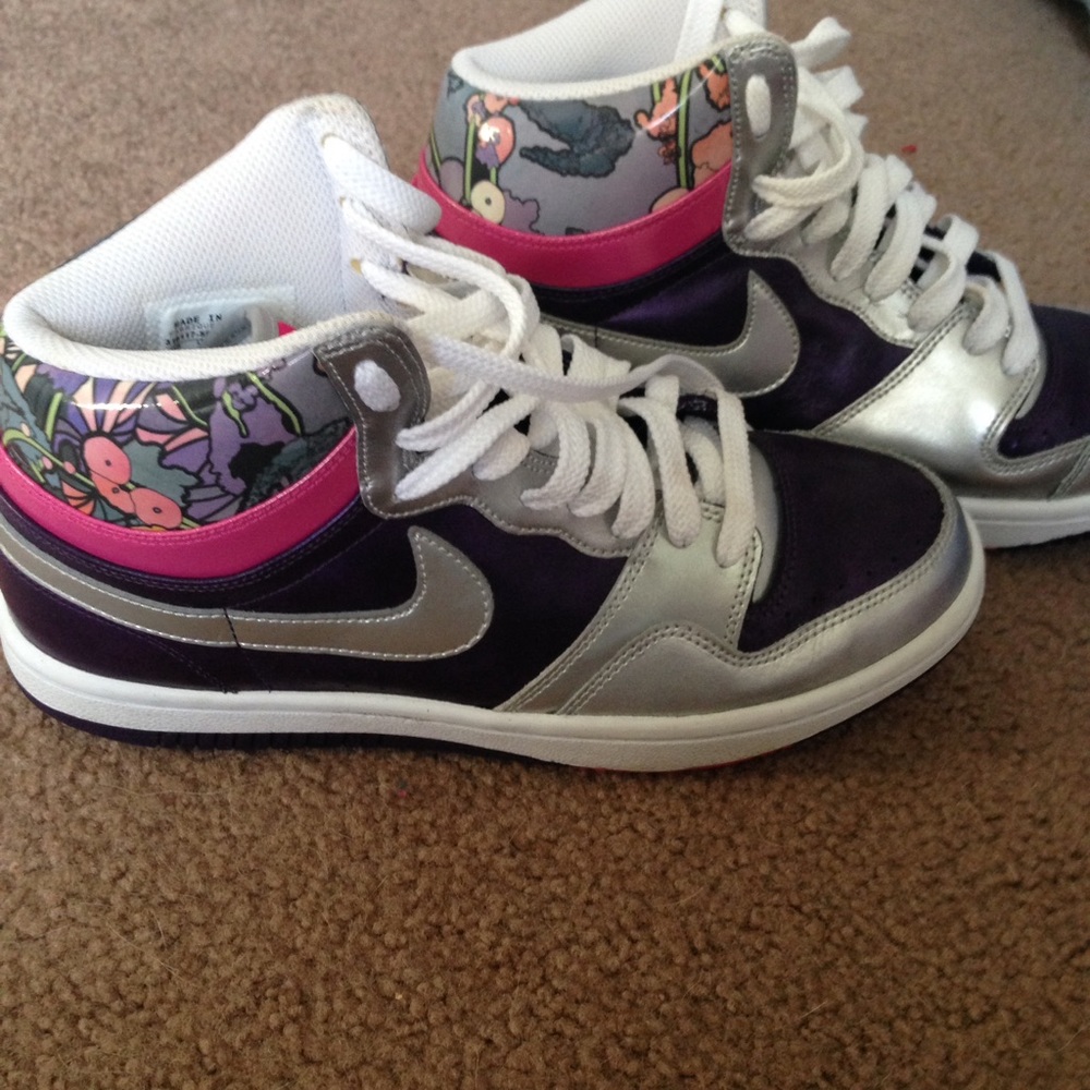 High top Nikes with patterned design.