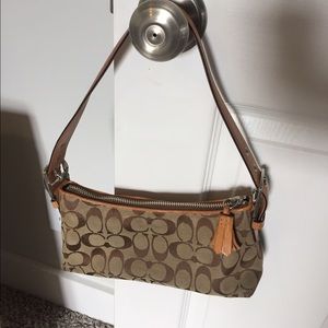 Tan coach purse
