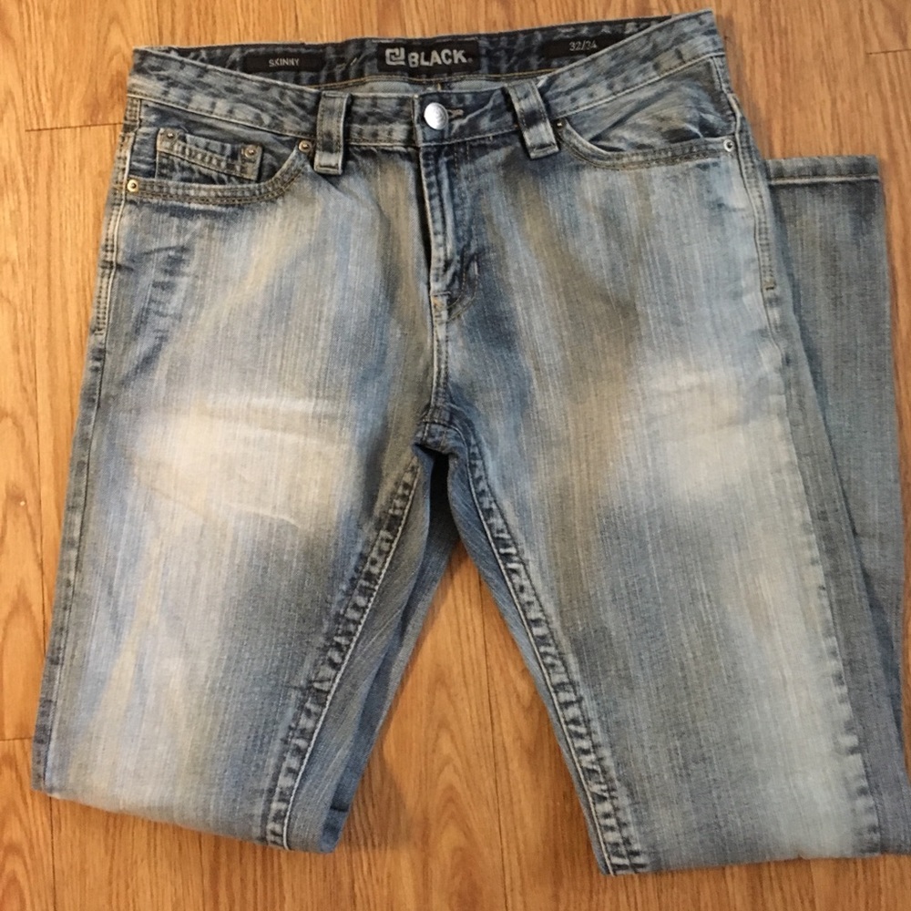 Infamous Peter Pan Black brand jeans.