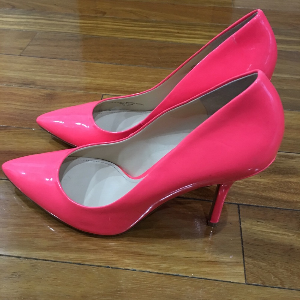 Neon pink pumps
