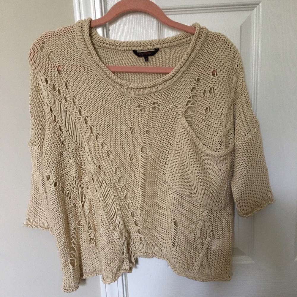 Ripped sweater