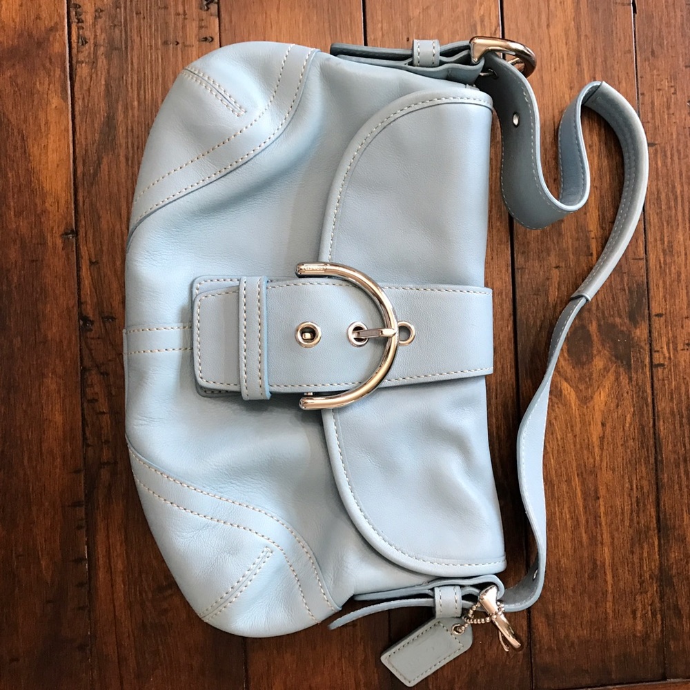 Small light blue, leather coach handbag