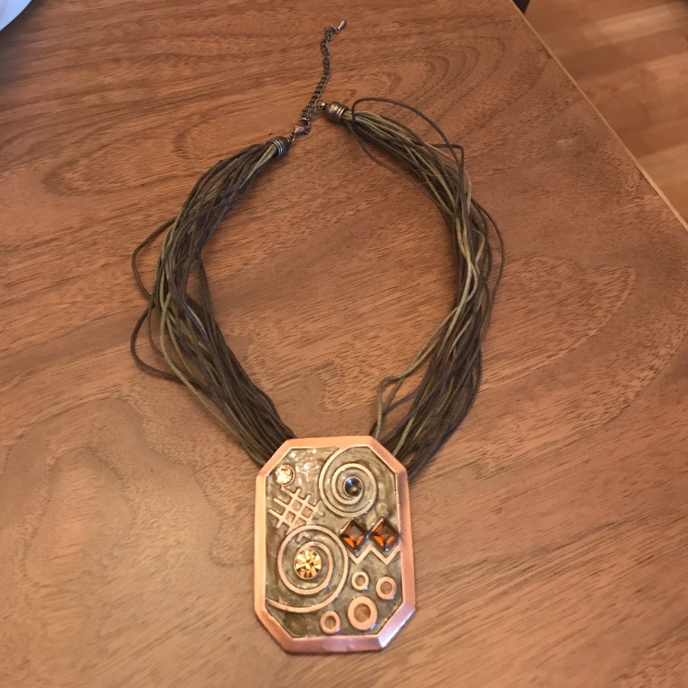 Leather strand necklace with copper pendant