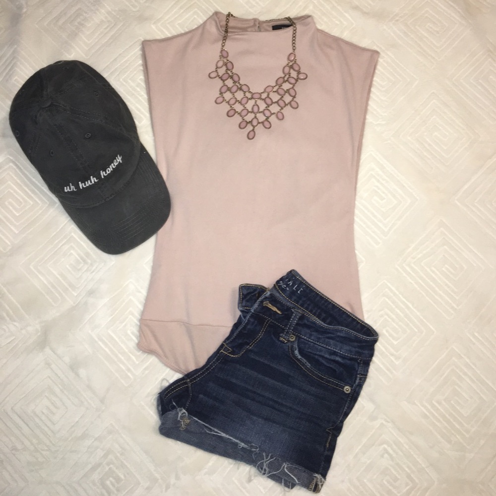 SOLD-Mauve bodysuit. Open on the sides.