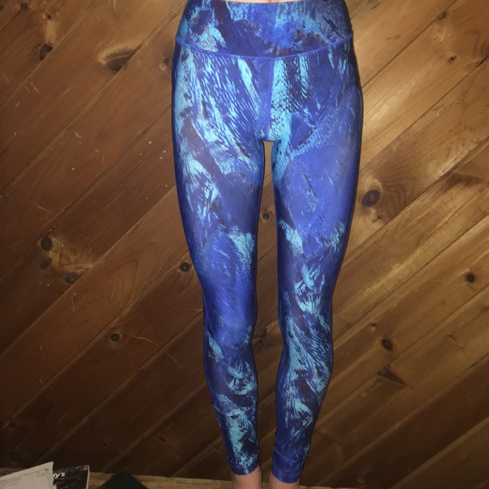 Blue patterned Under Armor leggings.