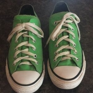 Green converse with pink/orange tongues