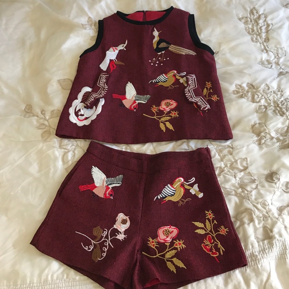 Embroidered vest and short.