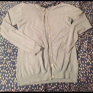 Light blue cardigan.