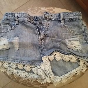 Light blue distressed jean shorts w/ lace