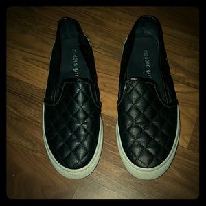 Black slip on sneakers
