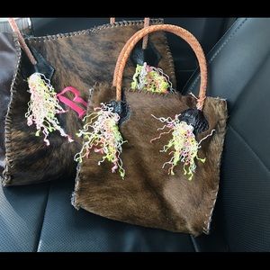 Cowhide and leather purses