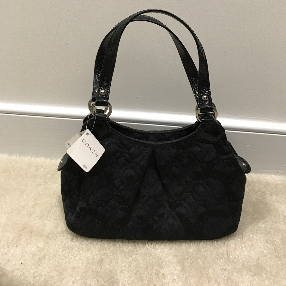 new coach handbag with original tag never used